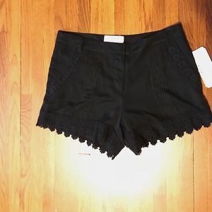 Women’s lightweight black lacy shorts size 2